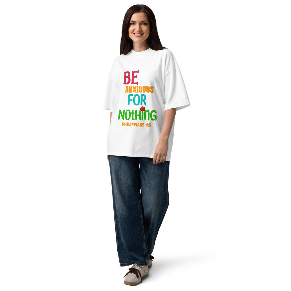 Woman wearing the Be Anxious for Nothing oversized white tee