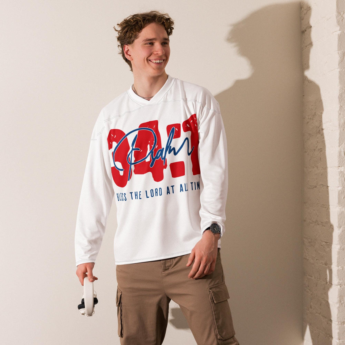 Model wearing the Psalm 34:1 Christian hockey jersey