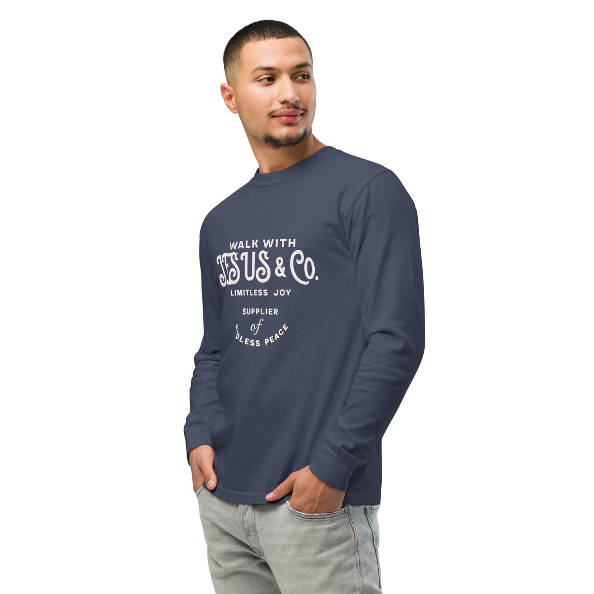 Man wearing the navy Walk With Jesus & Co Christian long sleeve shirt